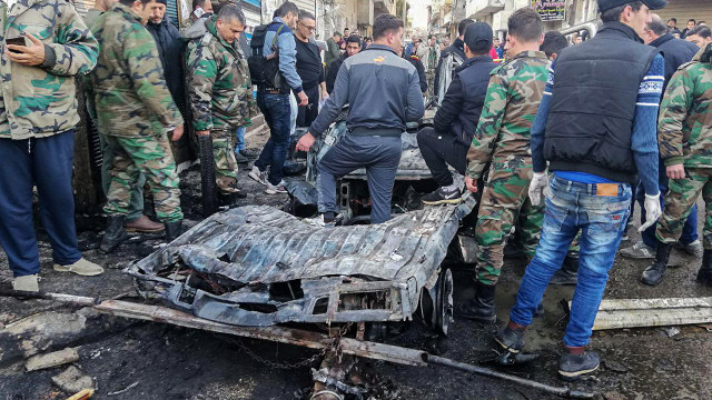 8 people died from a bomb in a market in Syria