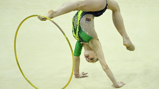 Title for Kaleyn on hoop, Nikolova won the silver medal