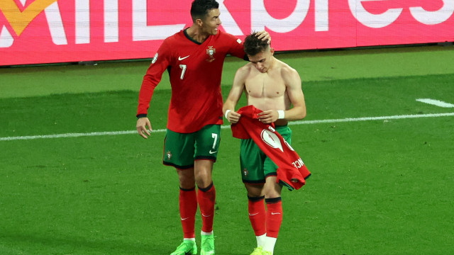 Francisco Conceicao of Portugal (R) celebrates with Cristiano Ronaldo of Portugal after scoring the 2-1 during the UEFA EURO 2024 group F match between Portugal and Czech Republic, in Leipzig, Germany, 18 June 2024. EPA