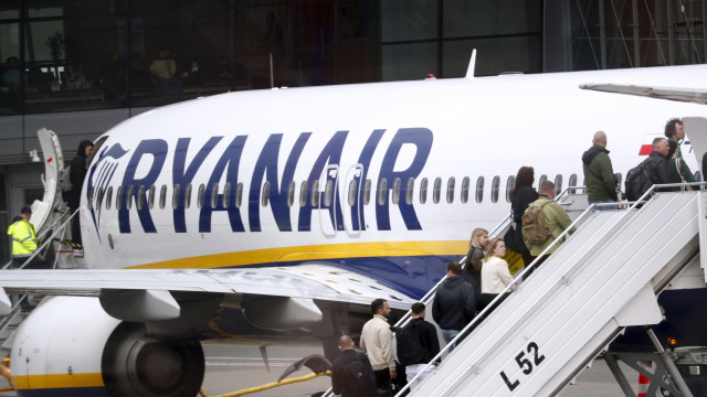 Ryanair's profit halved in the first quarter