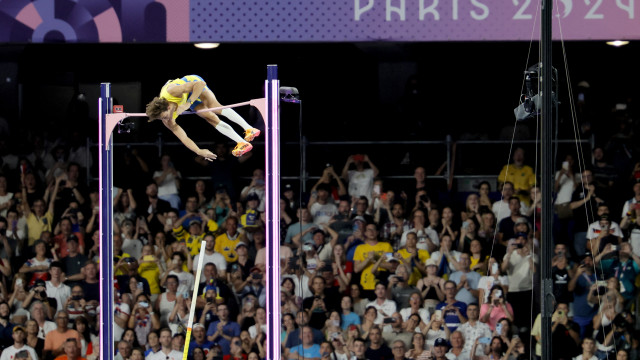 Armand Duplantis of Sweden clears the bar at 6.25m to set a new world record in the Men Pole Vault final of the Athletics competitions