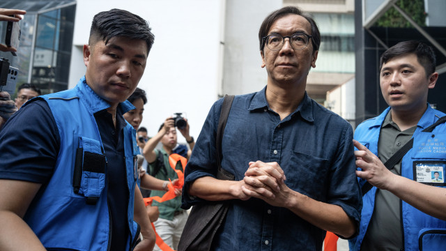 Hong Kong journalist sentenced to 21 months in prison